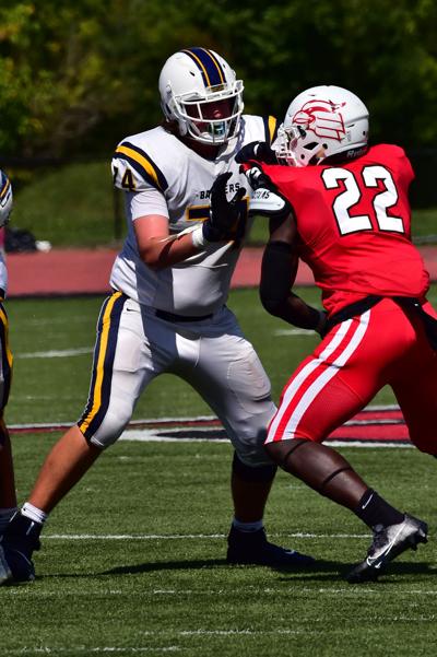 Payton Hawkins former Lincoln HS player starting for the Battlers on the OL.JPG